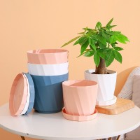 廠家直銷簡約創(chuàng)意仿瓷塑料花盆圓形加厚大號花盆樹脂塑料套裝批發(fā)